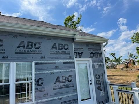 New house wrap on the rear wall of a townhome in Ambler, PA before new siding