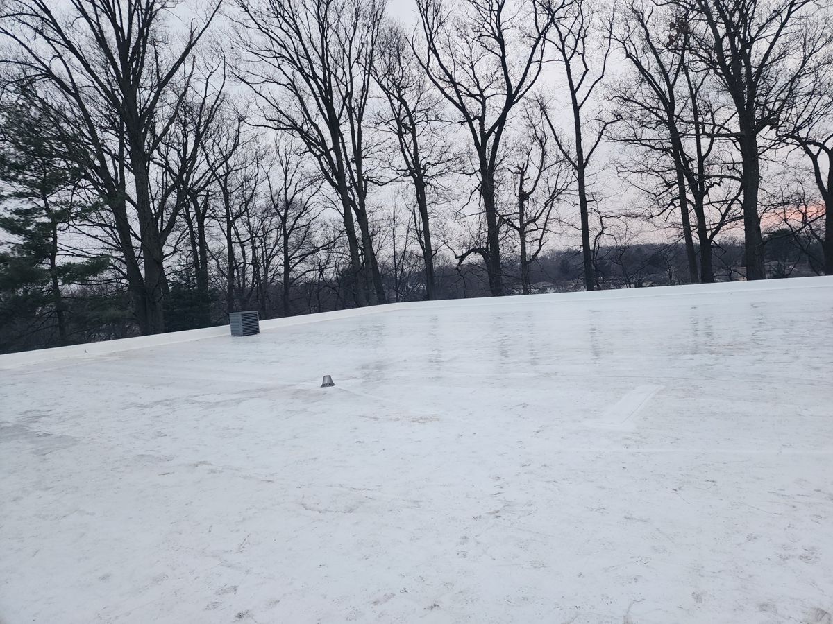 Finished white TPO roof on a large commercial building in Northeast Philadelphia