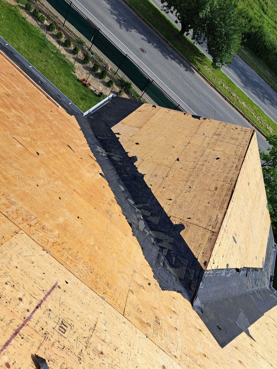 New plywood decking and leak barrier in a roof valley during a replacement in Northeast Philadelphia