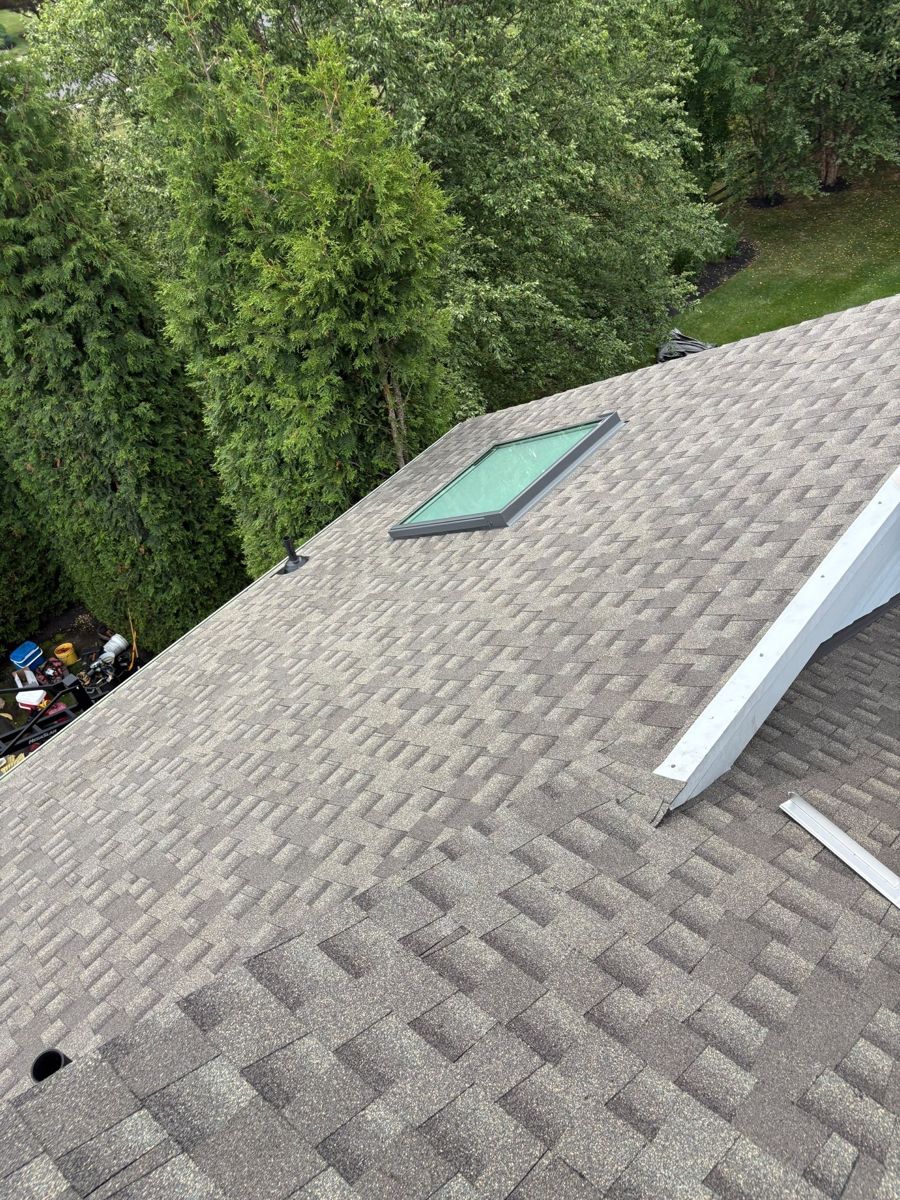 New VELUX skylight set into a new shingle roof in Dresher, PA