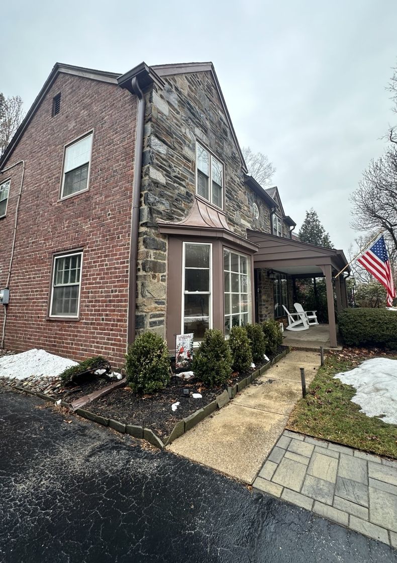 Stone and brick home in Merion Station, PA before its roof replacement