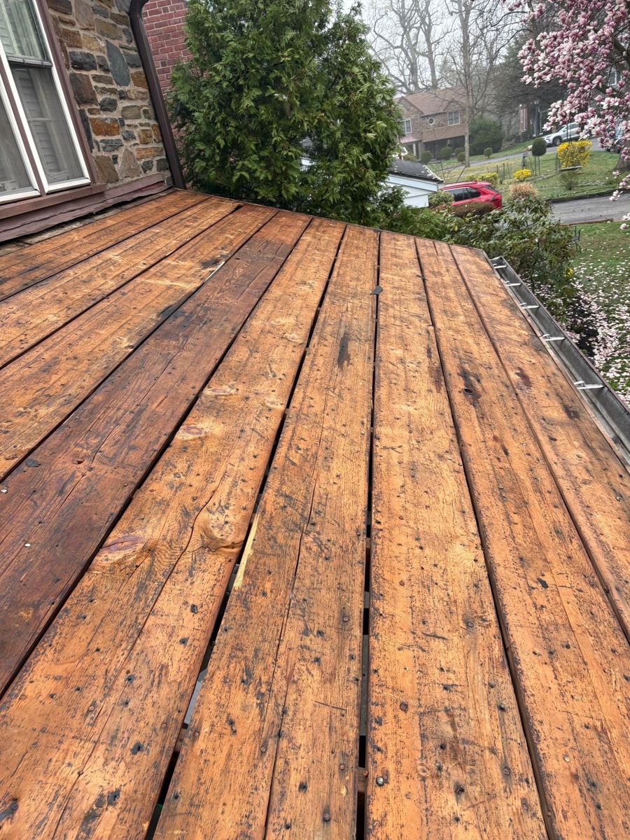 Original plank board roof decking exposed on a home in Merion Station, PA