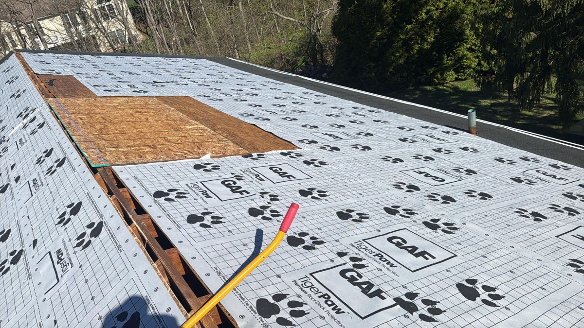 New decking patched into a roof and GAF synthetic underlayment going down in Lansdale, PA