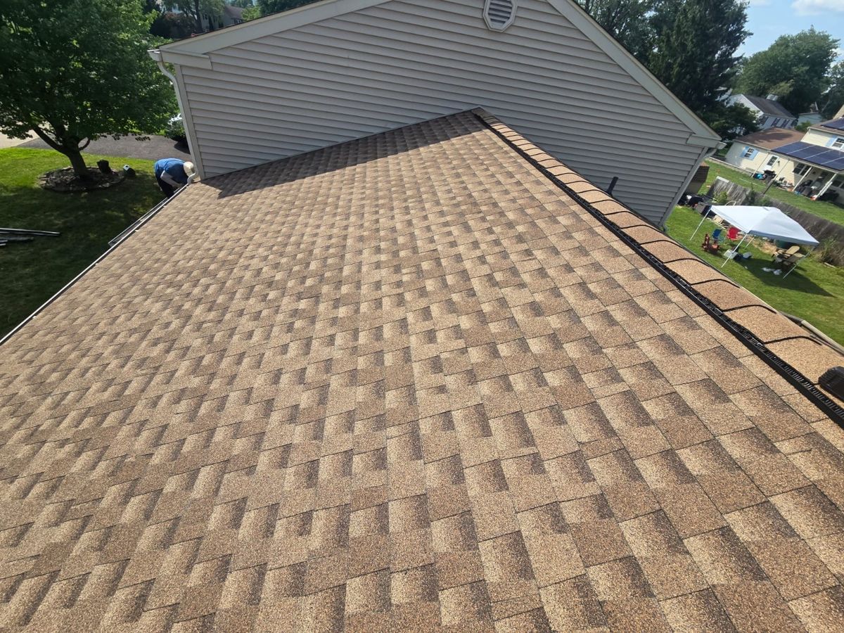 New brown GAF Timberline HDZ shingle roof on a two-story home in Chalfont, PA