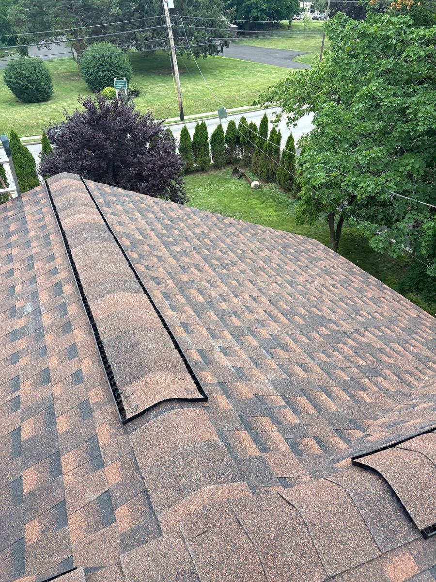 New shingles going on with the ridge vent in place in Willow Grove, PA