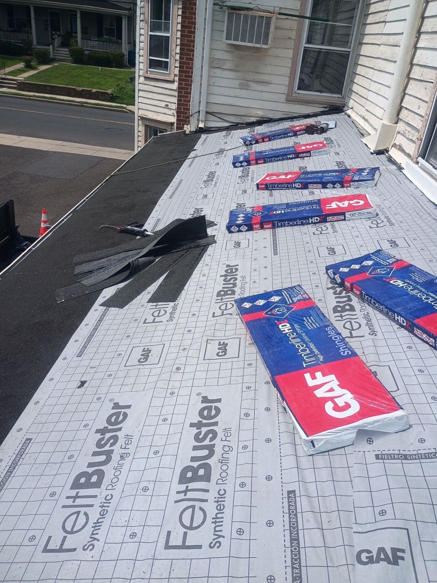 GAF FeltBuster underlayment and bundles of GAF Timberline HDZ shingles on a Yardley roof